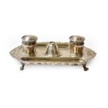 An Edward VII Silver Inkstand, by Charles Stuart Harris, London, 1903, in the rococo-style, shaped