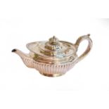 A George III Silver Teapot, by Michael Starkey, London, 1819, compressed circular and on collet