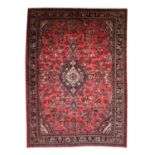 Large Hamadan CarpetWest Iran, last quarter 20th centuryThe brick red field of flowering plants