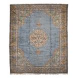 Large Oushak Carpet West Central Turkey, circa 1910 The plain sky blue field centred by a