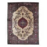 Isparta Carpet Central Turkey, circa 1930The cream field sparsely decorated with vines around a