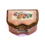 An 18th century enamel pill box of serpentine form, pink ground with raised white enamel and painted