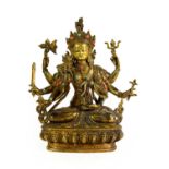 A Sino-Tibetan Gilt Bronze Figure of a Bodhisattva, in 17th century style, the eight-armed figure