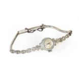 A lady's 18 carat white gold diamond set wristwatchThe total weight is 15 grams, the bracelet with