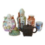 A collection of Chinese polychrome porcelain including figure of Buddha, pair of knife rests and