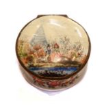 An 18th century circular enamel box with hinged cover, painted with a courting scene in a river
