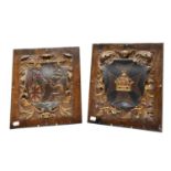 A pair of early 20th century carved wood panels depicting Malta and Australia - ceiling panels