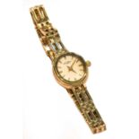 A lady's 9 carat gold Rotary wristwatch, quartz battery driven movement, with Rotary box and