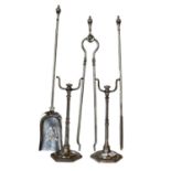 A set of early 19th century steel fire irons with a pair of stands on hexagonal bases (5)