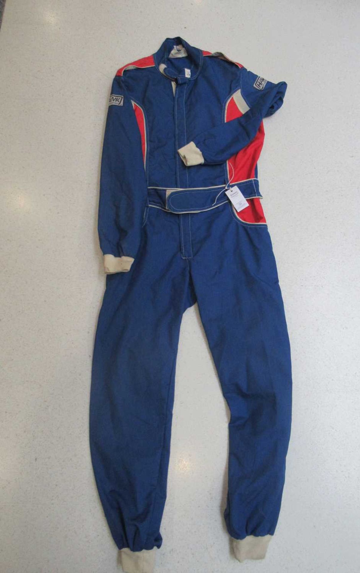 A Nomex Blue and Red Car Racing Suit, 40 inch chest size, and a Nomex Two Piece Green and Purple