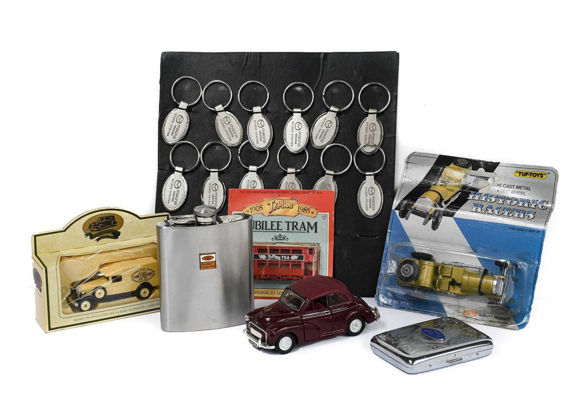 A Ford Tractors Stainless Steel 7oz Hipflask, a Ford Chrome Plated Cigarette Case, with engraved