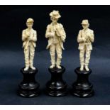 A set of three 19th century European carved ivory figures, possible Dieppe formed as musicians and