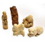 A Japanese Edo period carved ivory netsuke formed as a sage; together with three other netsuke one