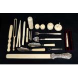 A quantity of 19th/early 20th century ivory and ivory mounted tools to include: page turner with