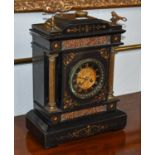 A Victorian black slate striking mantel clock, circa 1880, the case front depicting Classical