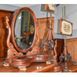 A Victorian mahogany toilet mirror, together with a Regency carved rosewood and brass polescreen,