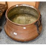 A 19th century copper cauldron with wrought iron handles, approximately 45cm wide
