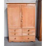 A Victorian pine linen press, 133cm by 55cm by 183cmThe outer cabinet with heavy wear and water