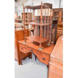 A Victorian mahogany three-tier whatnot with pierced scrolling gallery with turned supports, 53cm by