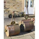 Two Victorian garden rollers, one with lion decorated metalwork, the other cast for Aveling &