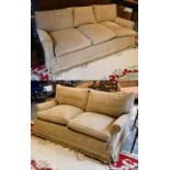 Beige upholstered two-piece feather filled suite comprising a three-seater, 204cm wide by 96cm by