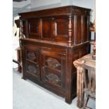 A Salisbury Joined Oak Press Cupboard, late 17th century, the later boarded top above a moulded