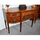 A 19th century cross banded and inlaid mahogany bow and break fronted sideboard, with brass gallery,