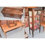 An Edwardian mahogany slender glazed fronted display case, 58cm by 32cm by 147cm, together with a