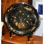 A Victorian papier mache tray decorated with floral sprays and birds of paradise 76cm by 63cm