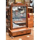 A George III mahogany dressing table mirror, the platform base fitted with a drawer, 44cm by 23cm by