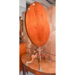 A Victorian carved mahogany tilt top table, 81cm by 54cm by 72cm