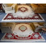 Indian 'Savonnerie' Carpet, the cream field with an oval medallion framed by blood red borders,