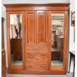 An Edwardian mahogany and satinwood crossbanded mirrored wardrobe 194cm by 58cm by 217cm