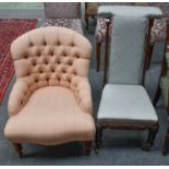 A Victorian buttoned nursing chair upholstered in pink togther with a prie dieu chair with