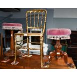 A Regency gilt occasional chair with canework seat, an oak footstool of similar date and a