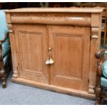 A Victorian pine cabinet with single drawer above a pair of doors, 128cm by 49cm by 110cm