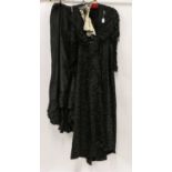 S Fowler & Sons Blackburn Late Victorian Black Figured Silk Dress, with cream silk modesty panel