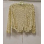 An Edwardian Irish Crochet Lace Blouse with three-quarter length sleeves, flared cuffs, square