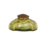 An Art Nouveau Austrian Iridescent Glass Inkwell, the brass metal hinged cover with clear glass