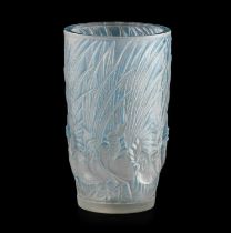 René Lalique (French, 1860-1945): A Stained and Frosted Coq Et Plumes No.1033 Glass Vase, moulded in