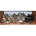 A large assorted collection of silver plated items including muffin dish, entree dish, spirit kettle