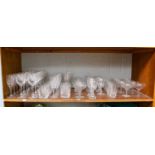 A collection of cut glass and crystal drinking glasses including Royal Brierly, comprising twelve