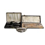 Cased composite manicure set, cased silver shoe horn and button hook, two smaller hooks, epns purse