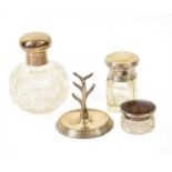 Two Silver-Mounted Cut-Glass Scent-Bottles, on globular with plain hinged cover, the other of square