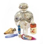 A Collection of Assorted Scent Bottles, including: a silver-mounted globular example, the neck