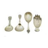 Four Victorian and Later Caddy-Spoons, including: one in the form of a hand, by Francis Howard Ltd.,