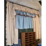 Decorative curtains comprising a pair of cream grosgrain long curtains with yellow trims to the