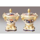 A pair of Royal Crown Derby Imari potpourri urns and covers (2)The rims of both covers restored. One