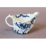 A Lowestoft low Chelsea ewer, circa 1760, painted in underglaze blue with flowers, 5.75cmCracked