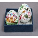Two pottery darning eggs, early 19th century, inscribed John painted with a bird and Ann with a